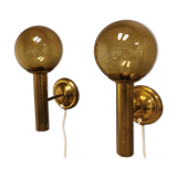 Set of solid brass wall lamps with smoked glass domes