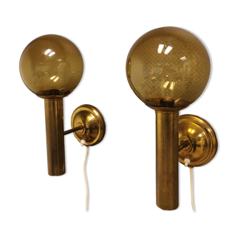 Set of solid brass wall lamps with smoked glass domes