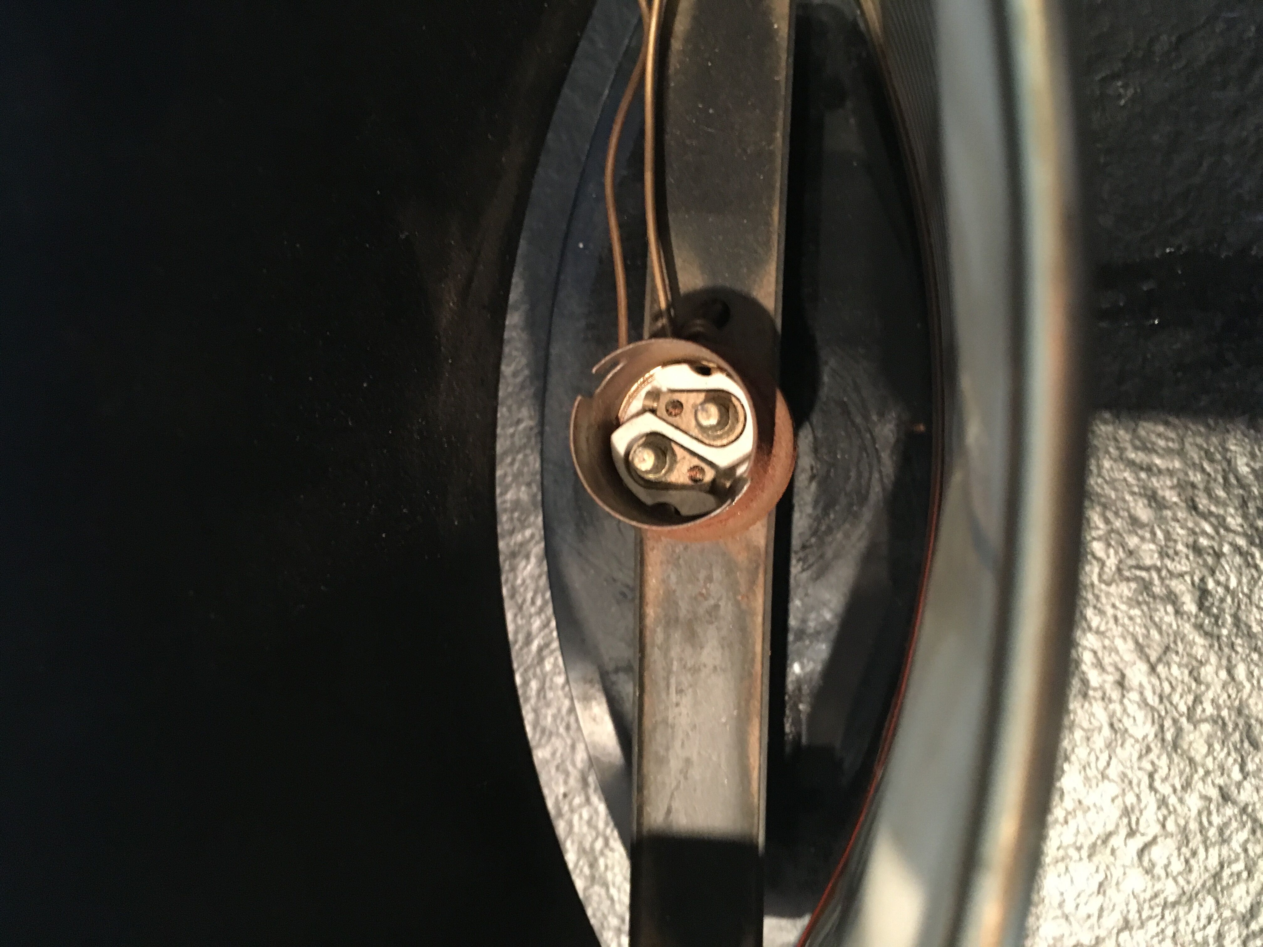 Black metal and gilded brass table lamp