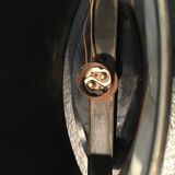 Black metal and gilded brass table lamp