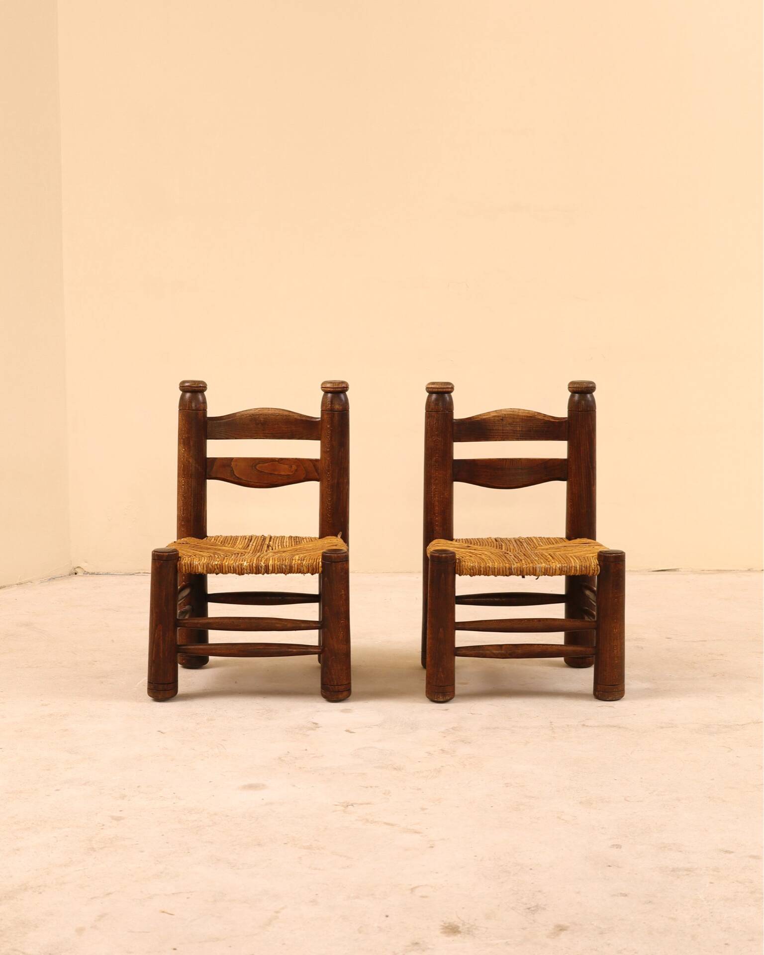 Low fireplace chair attributed to Charles Dudouyt.