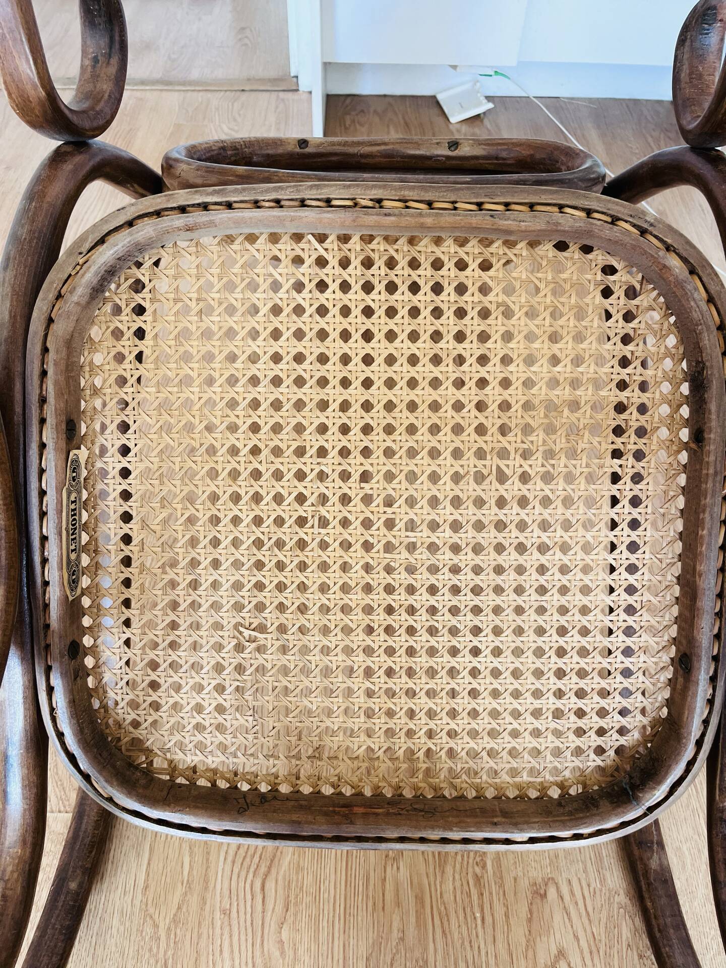 Antique Thonet bentwood rocking chair, original label.