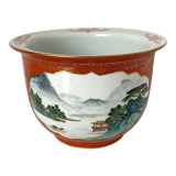 Chinese planter or Chinese porcelain pot cover decorated with landscapes on a coral and golden background