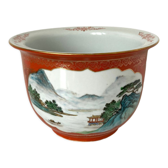 Chinese planter or Chinese porcelain pot cover decorated with landscapes on a coral and golden background