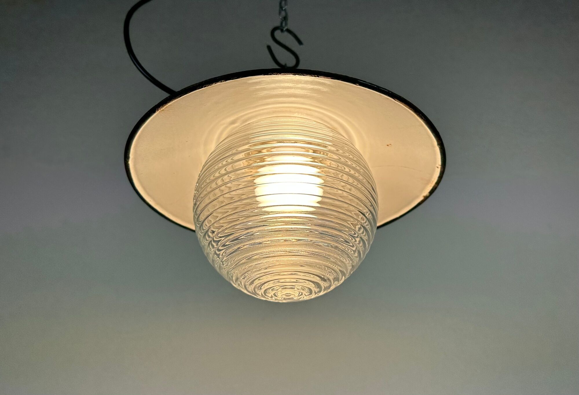 Industrial porcelain red enamel pendant light with ribbed clear glass, 1970s