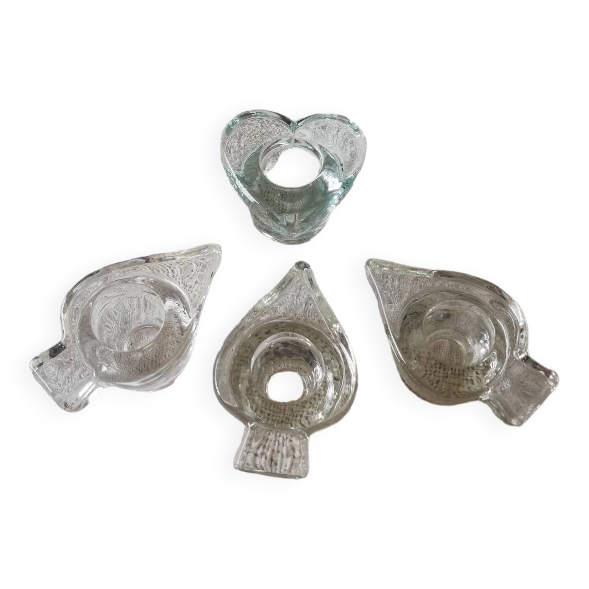 Set of four small transparent glass candle holders 3 spikes 1 heart