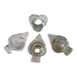 Set of four small transparent glass candle holders 3 spikes 1 heart