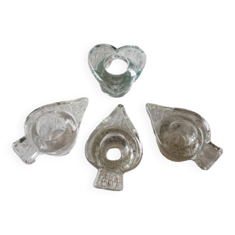 Set of four small transparent glass candle holders 3 spikes 1 heart