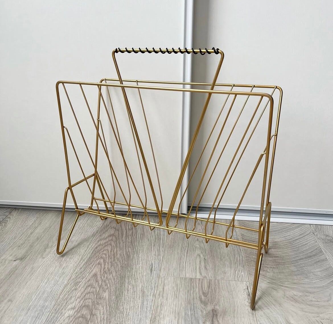 Vintage gold metal magazine rack