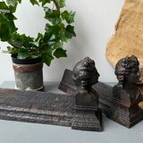 Pair of cast iron pegs