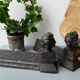 Pair of cast iron pegs