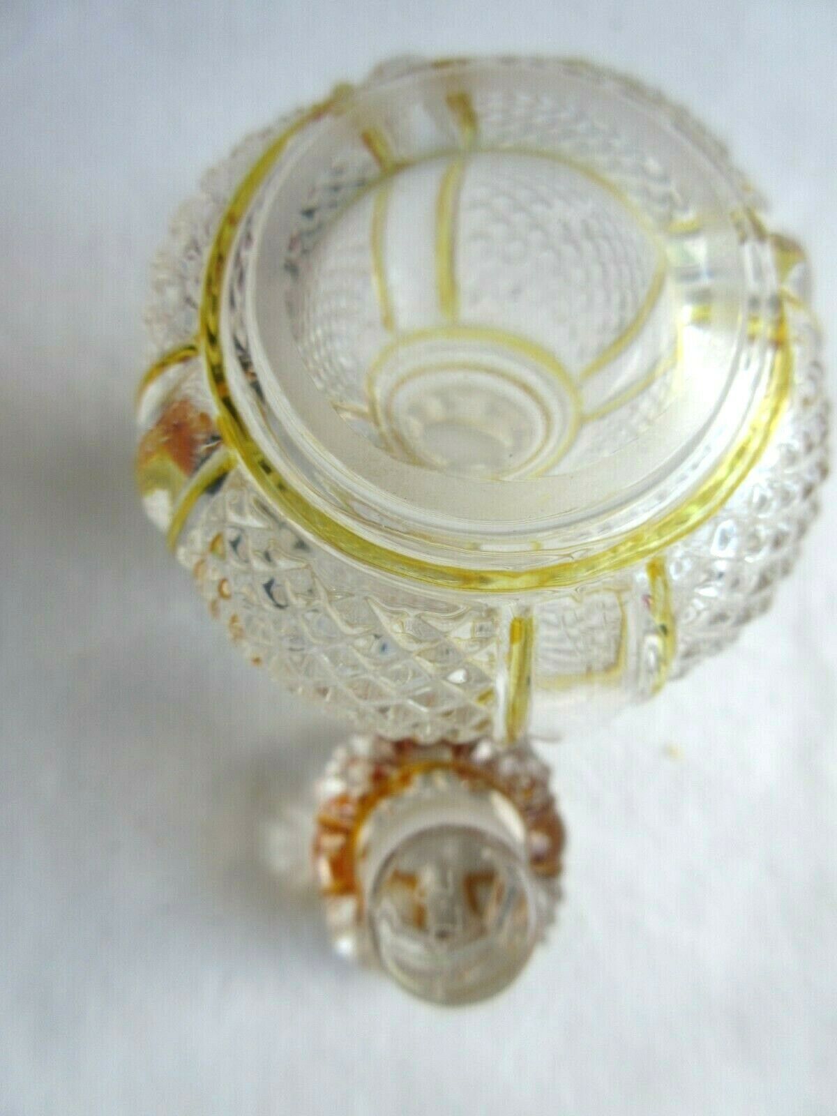 Baccarat perfume bottle, yellow eds and diamond tips