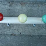 Wall coat rack with 3 hooks in different colors from the 1950s