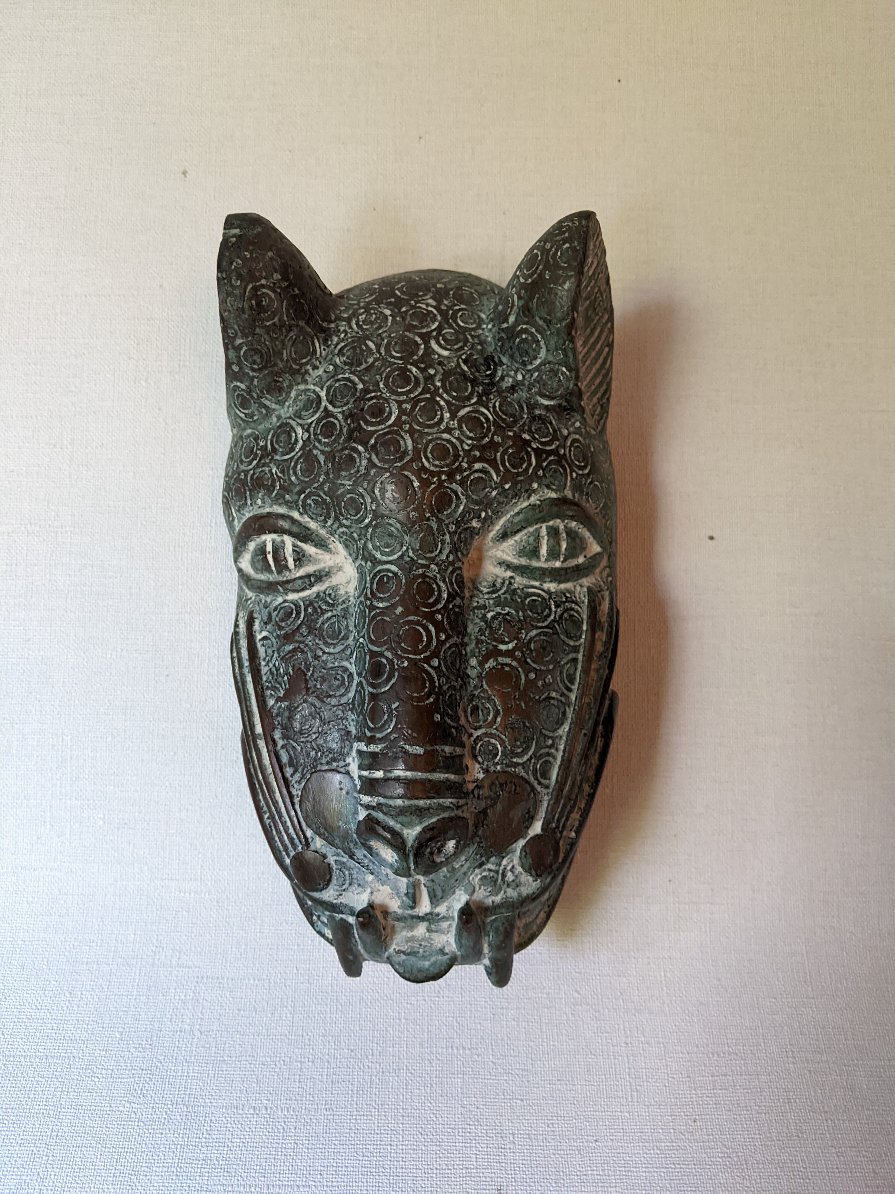 Bronze artisanal African art leopard tribal mask sculpture