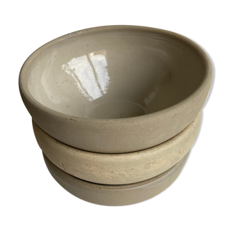 Trio of enamelled sandstone bowls