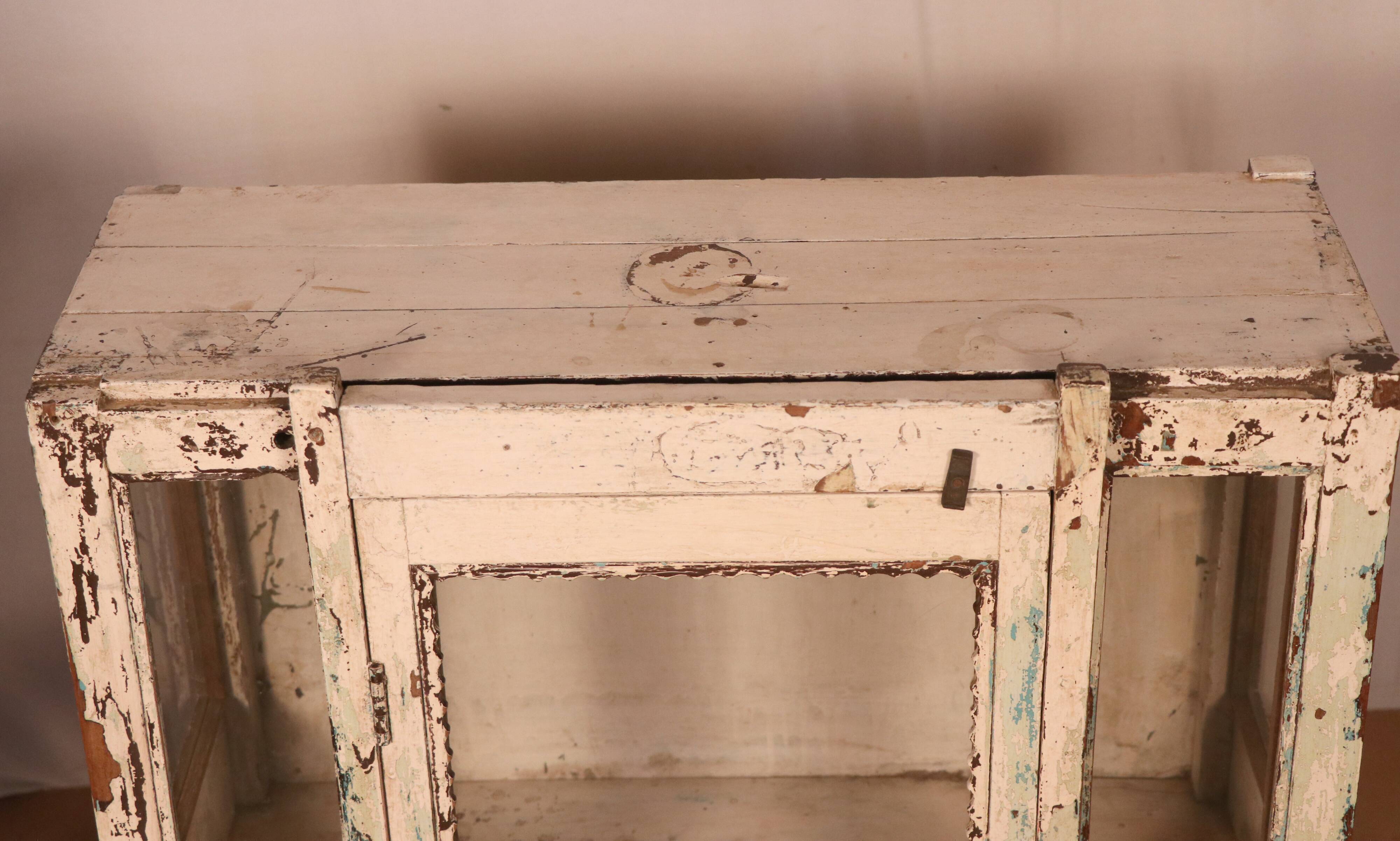 Former art deco cabinet in original burmese teak ecru patina
