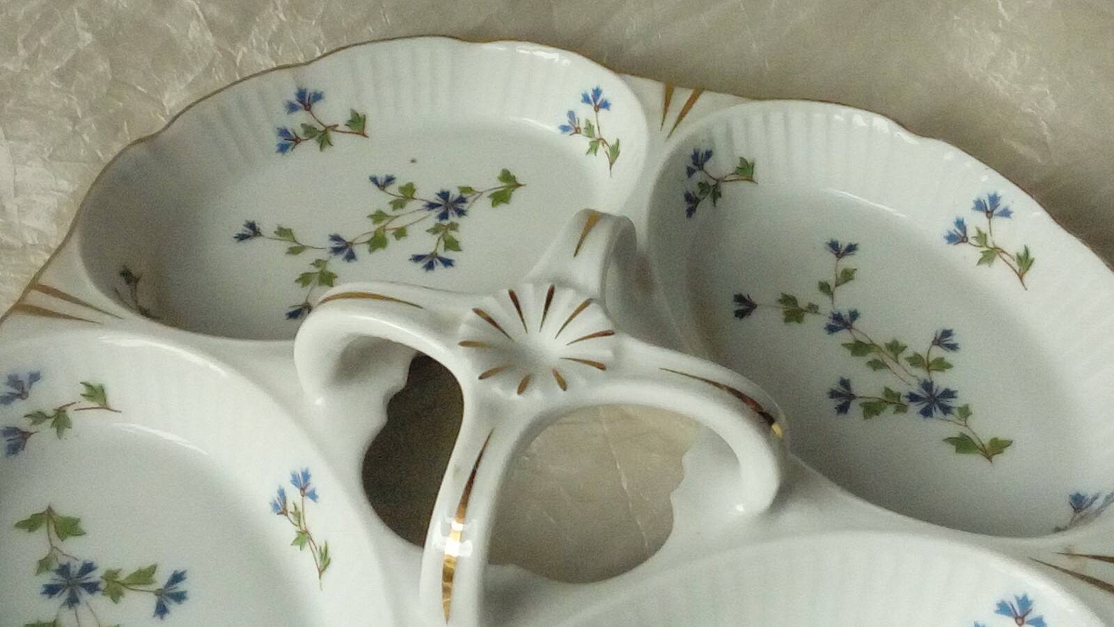 Louis lourioux foecy porcelain beggar's plate with barbell decoration