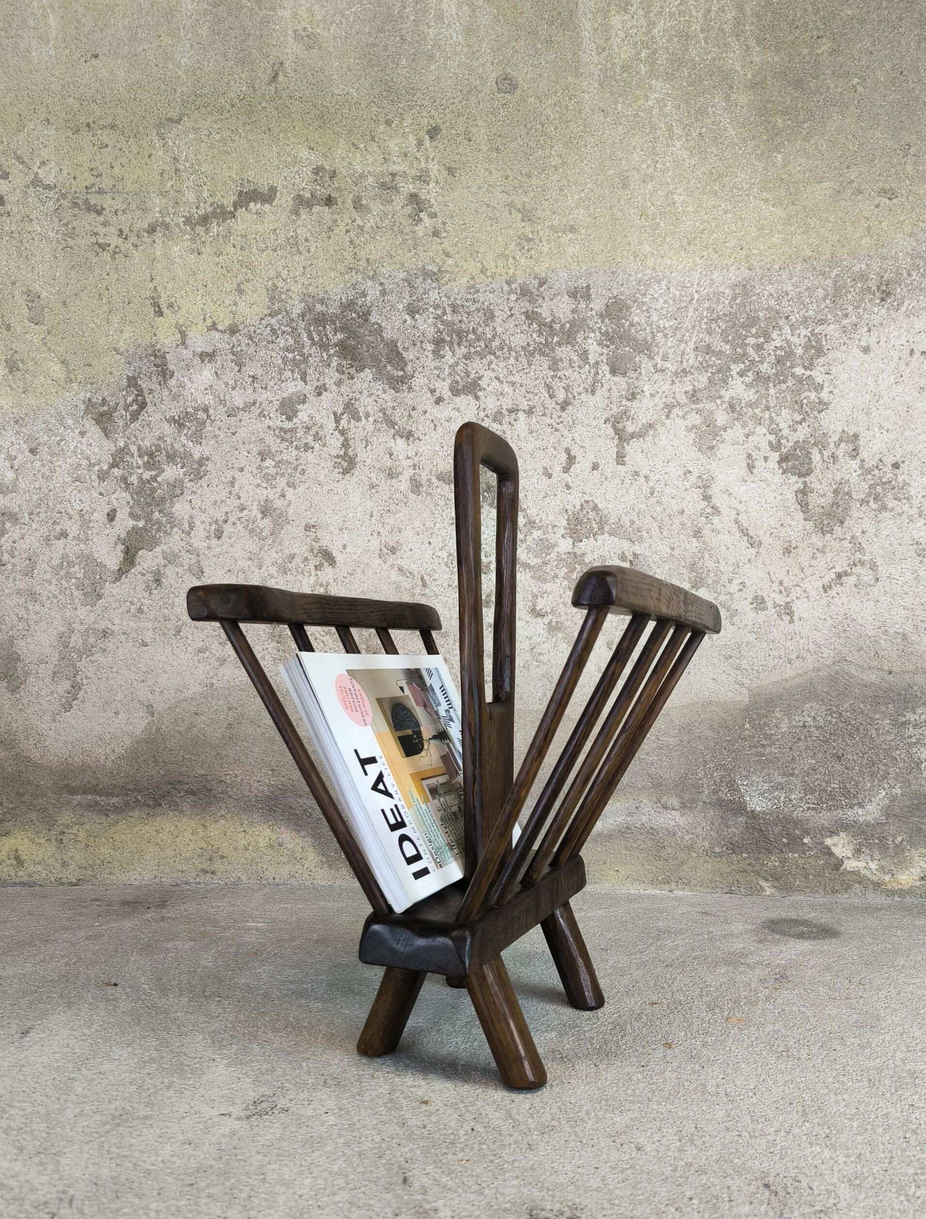 Vintage magazine rack in solid wood.