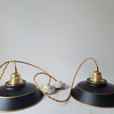 Duo of suspensions in enamelled sheet metal