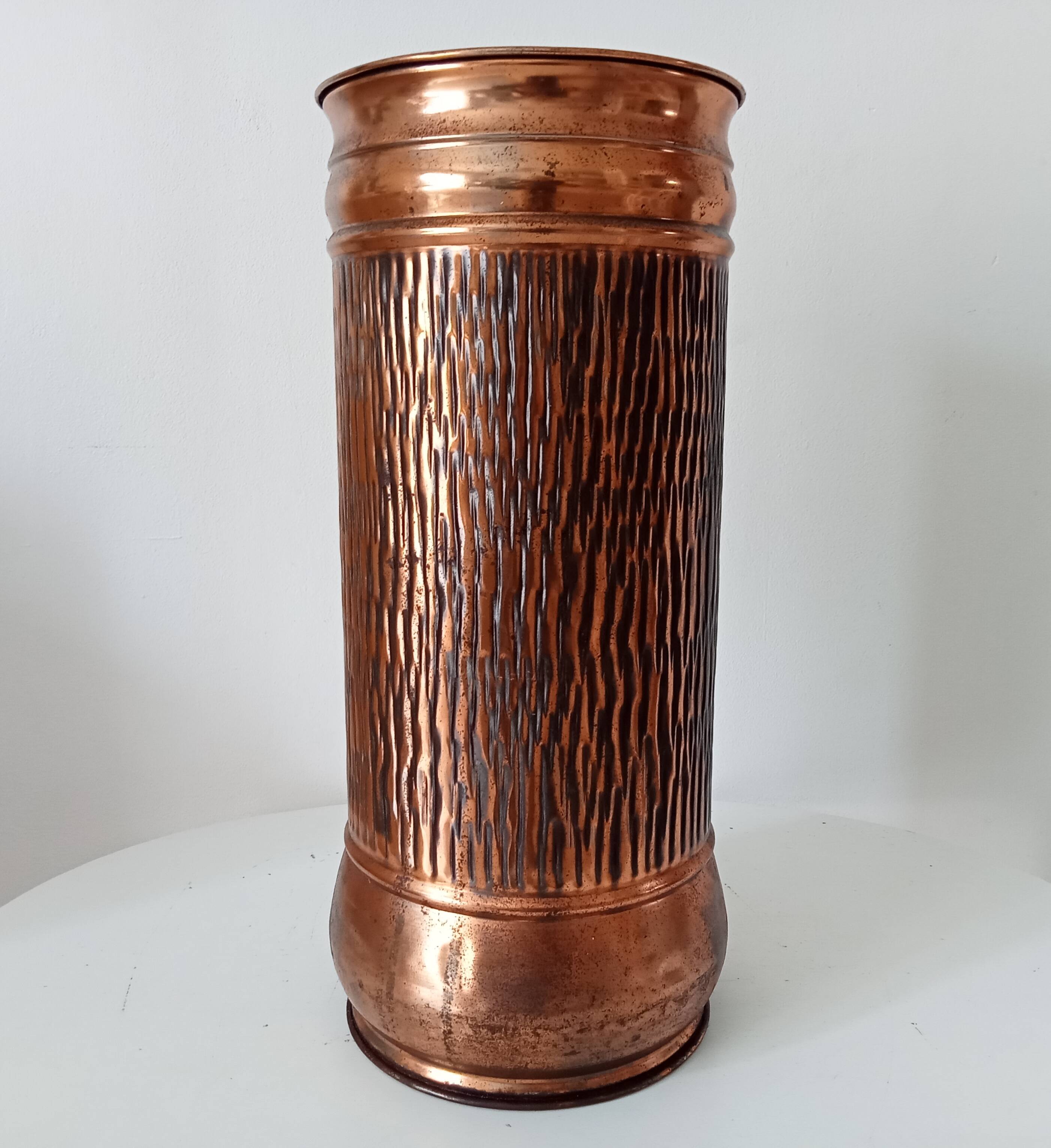 Vintage brutalist umbrella stand in hammered copper with a wood effect.
