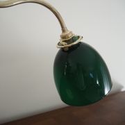 Desk lamp in brass with a swan neck and green opaline glass.