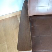 Scandinavian armchair in brown leatherette and wood