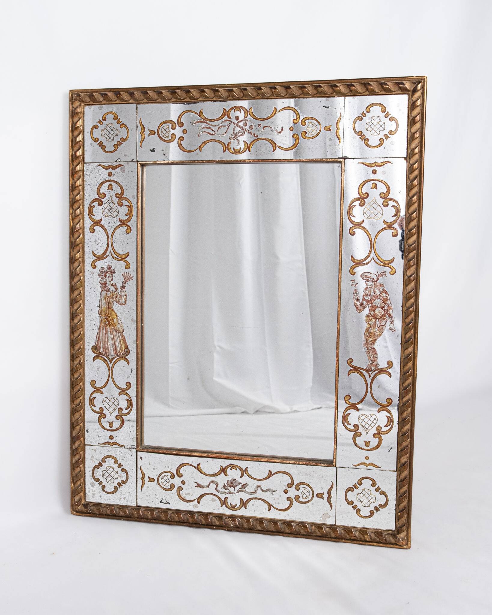 Miroir italien en verre églomisé, à parecloses, début XXe siècle