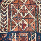 Tapis ancien noué main numéroté