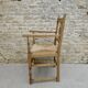 Fauteuil néo basque en bois clair et assise cannée