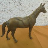 Brass saddled horse