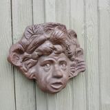 Child's face sculpture