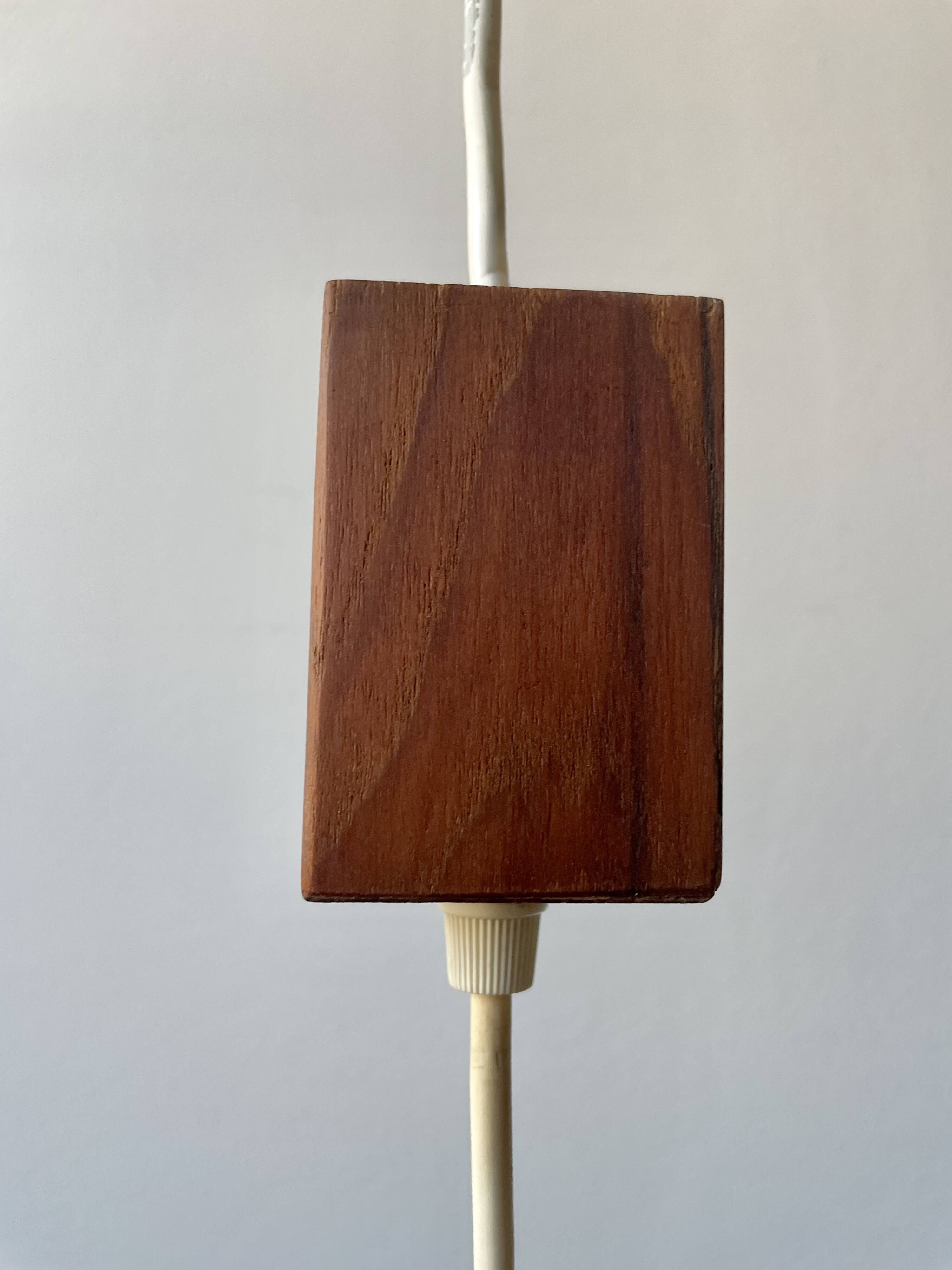 Teak and perspex pendant light from the 60s