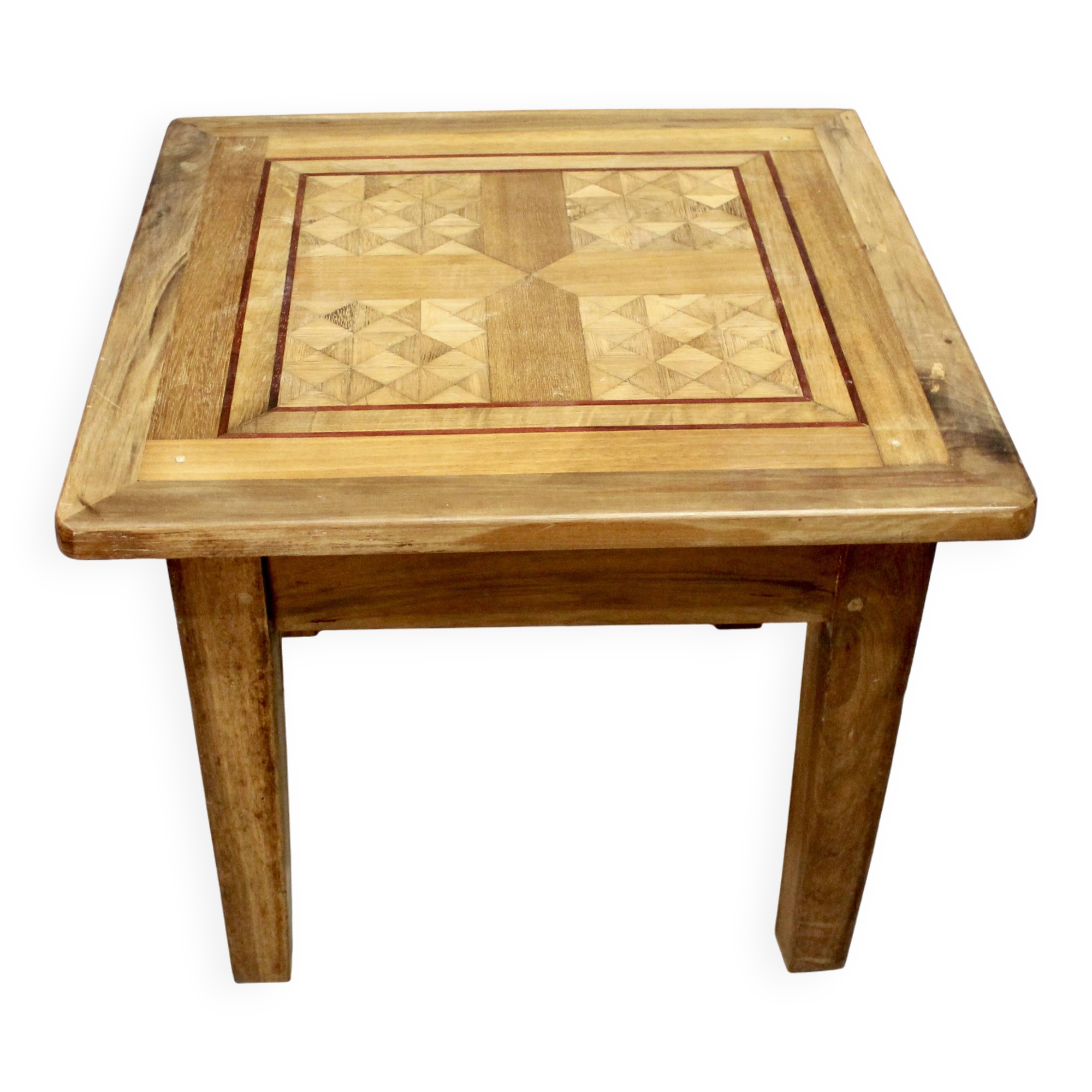 Coffee table on old parquet floor with marquetry
