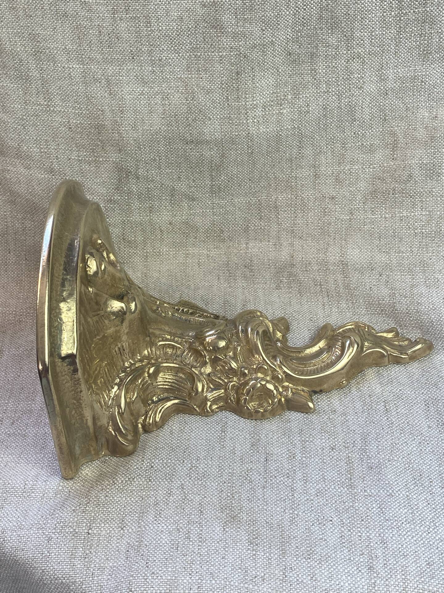 Small wall console in Rococo style in bronze