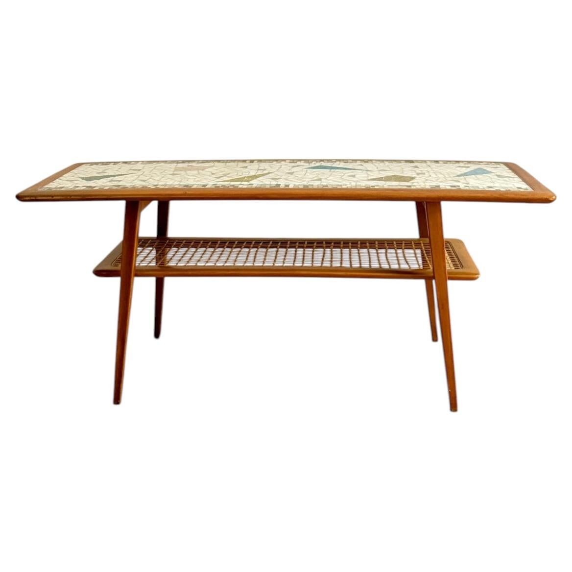 Mosaic coffee table, teak and straw, created by designer Paul Jensen.