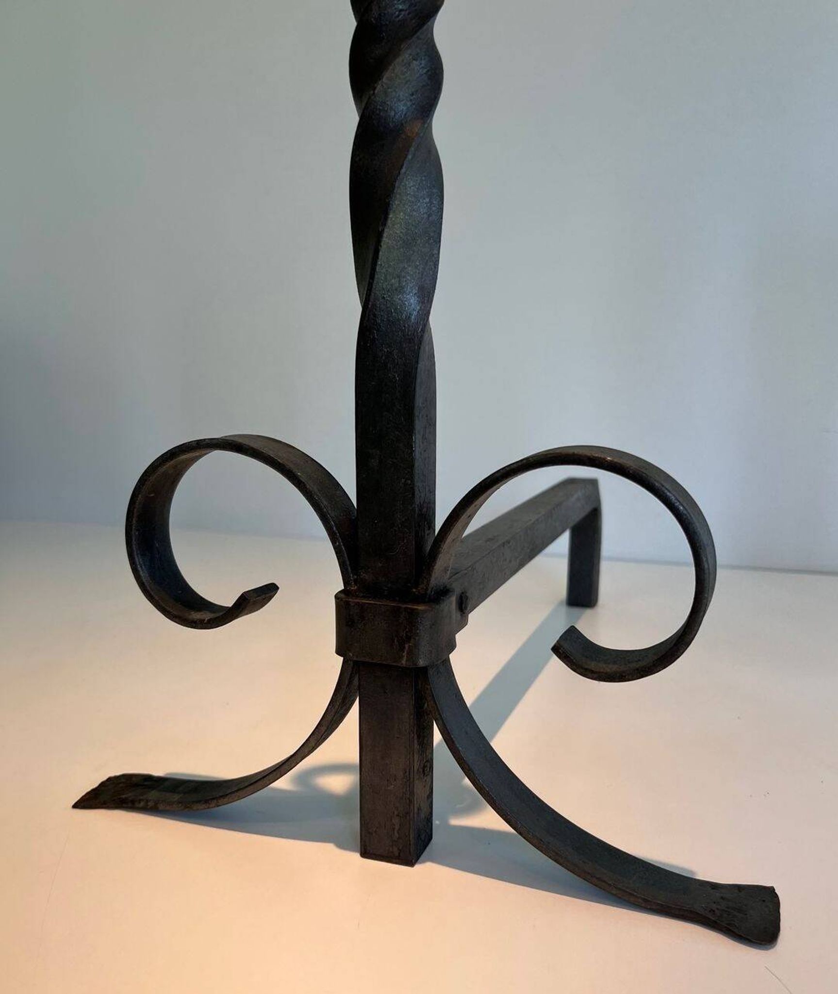 Pair of Neoclassical Fire Dogs in Wrought Iron with Twisted Columns, Finials