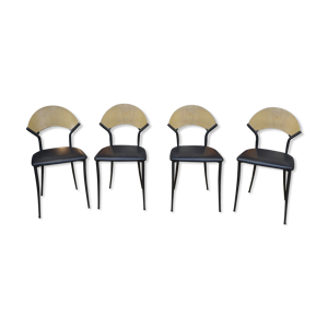 Lot de 4 chaises vintage structure en métal assise en simili cuir noir et dossier en hêtre des années