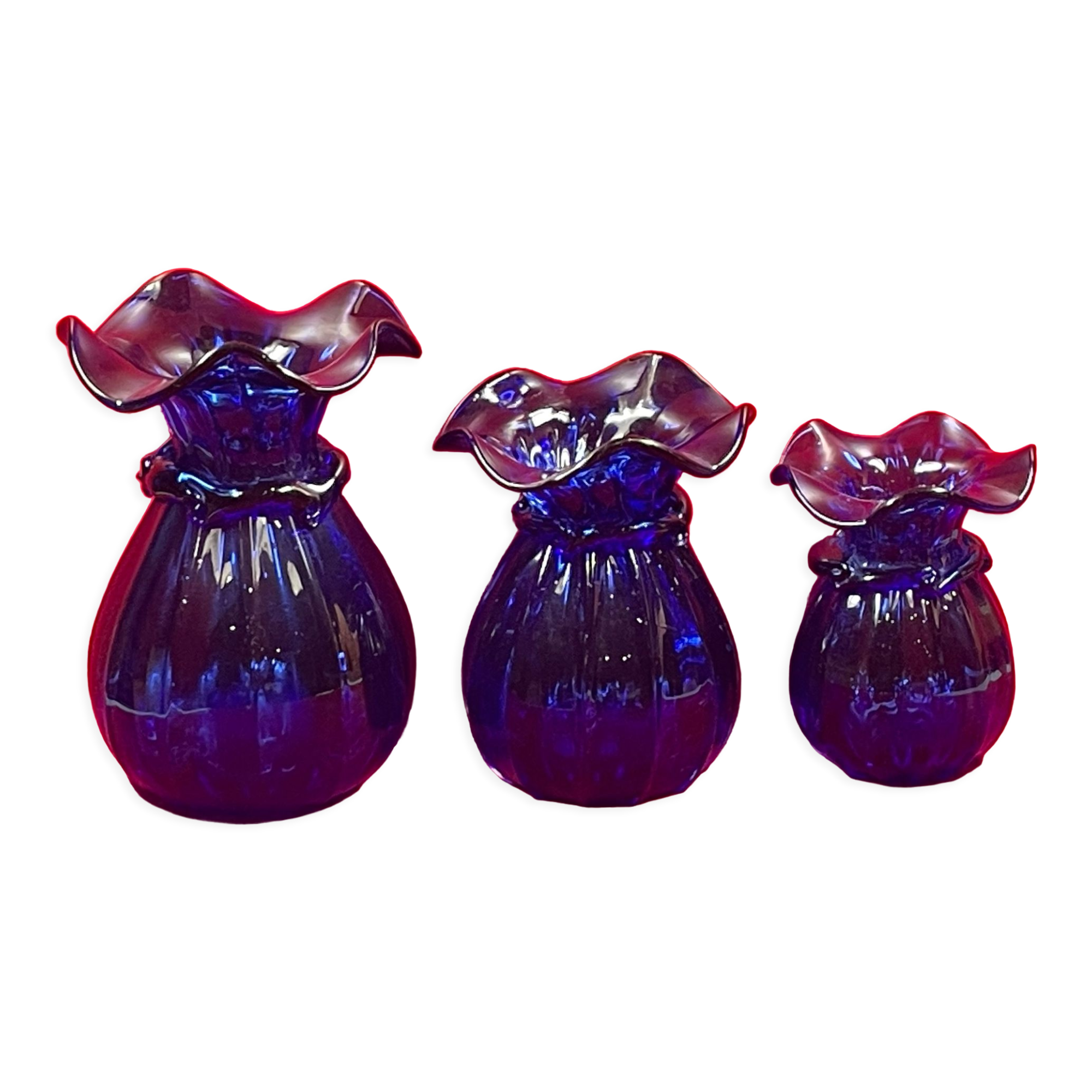 Series of 3 blue glass vases in the shape of a purse, 11, 13 and 17 cm