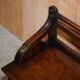 Antique entrance bench by Jas Shoolbred with brass fittings and walnut frame circa 1890.
