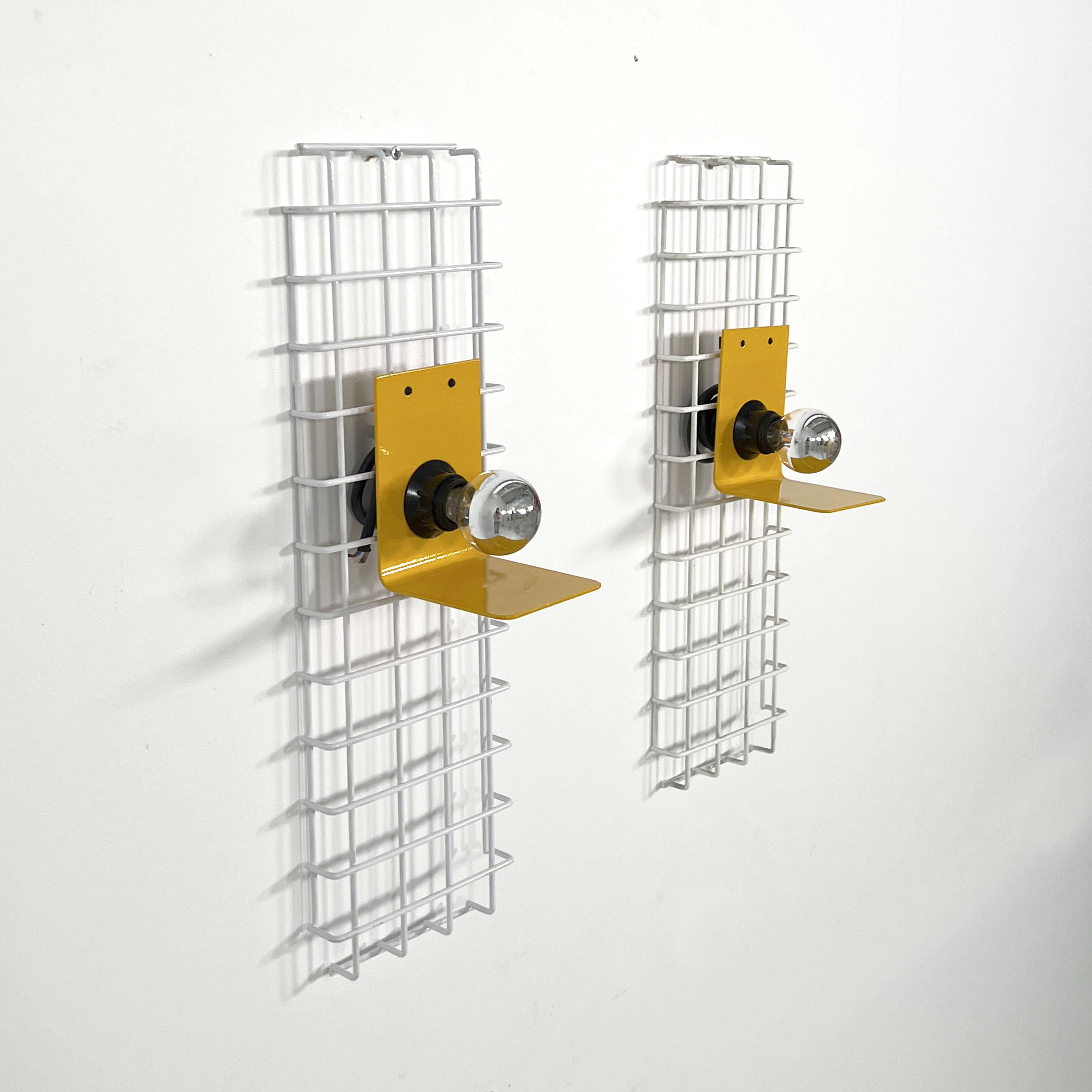 Pair of yellow wall sconces on wire mesh by Seccose, 1980