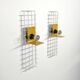Pair of yellow wall sconces on wire mesh by Seccose, 1980