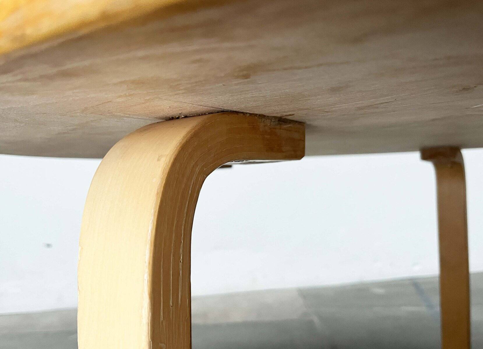 Mid-century modern yellow linoleum coffee table by Alva Aalto for Artek, Finland, 1960s.