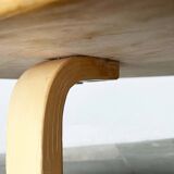 Mid-century modern yellow linoleum coffee table by Alva Aalto for Artek, Finland, 1960s.