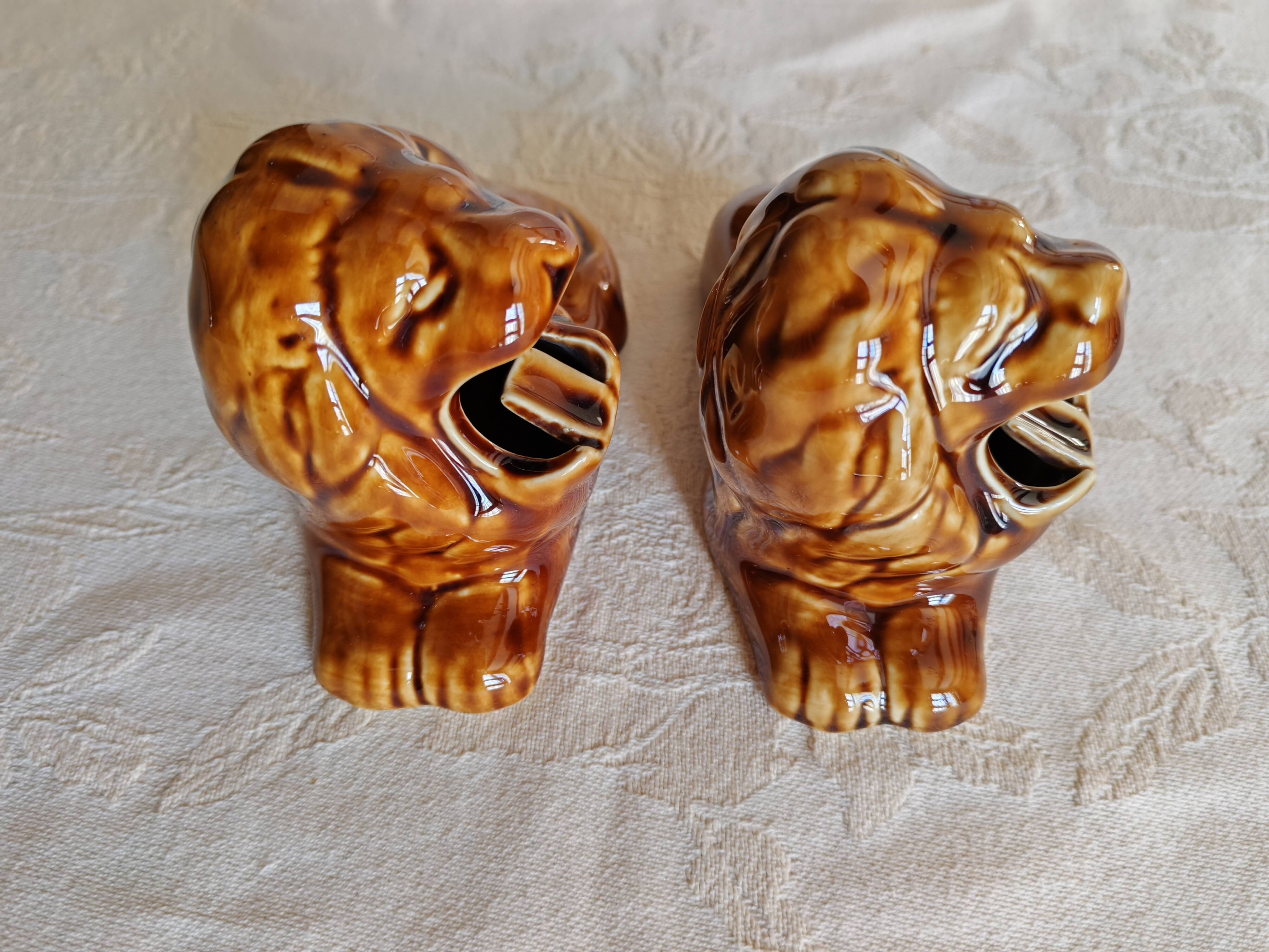 Pair of vintage lion ashtrays