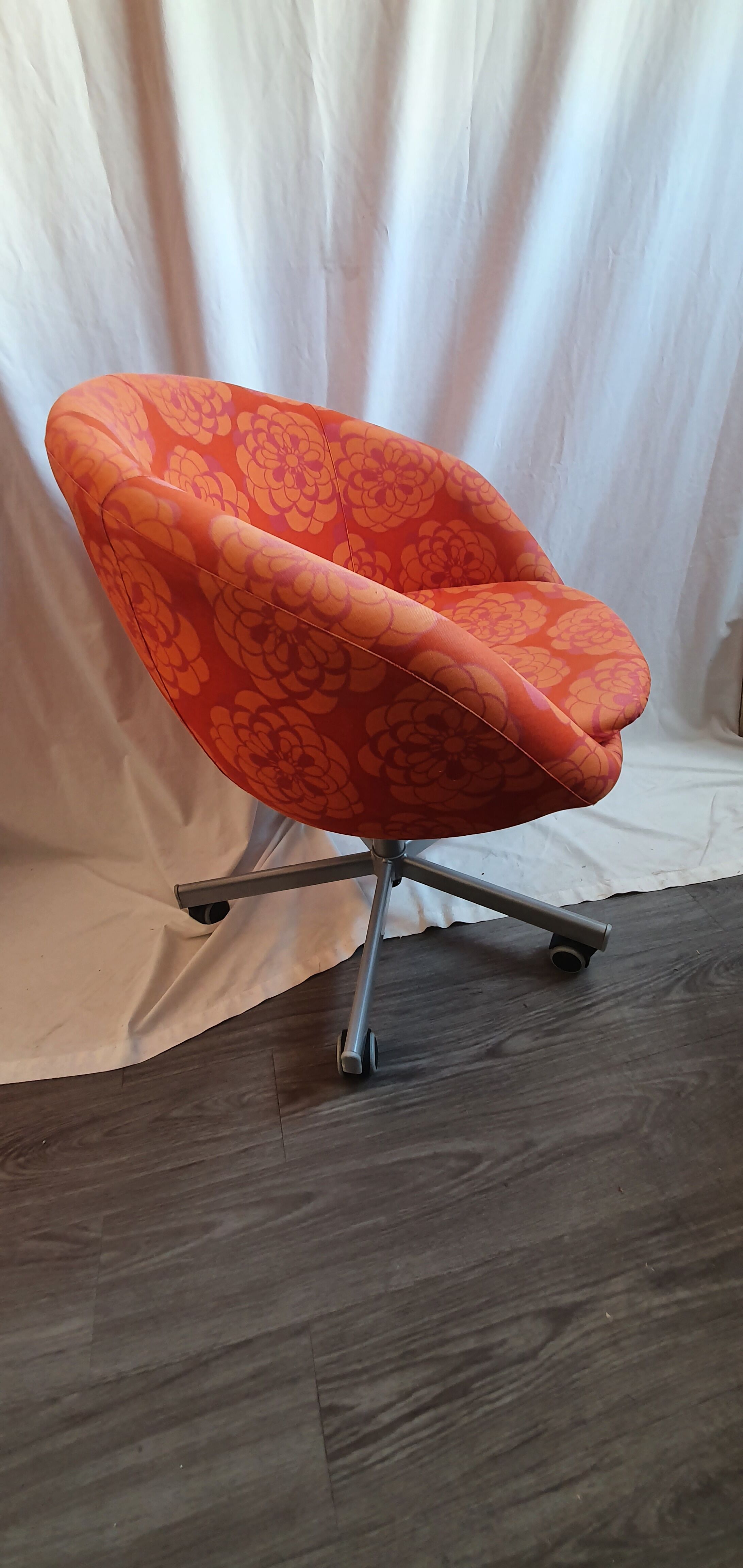 Seventies wheeled basket armchair