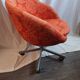 Seventies wheeled basket armchair