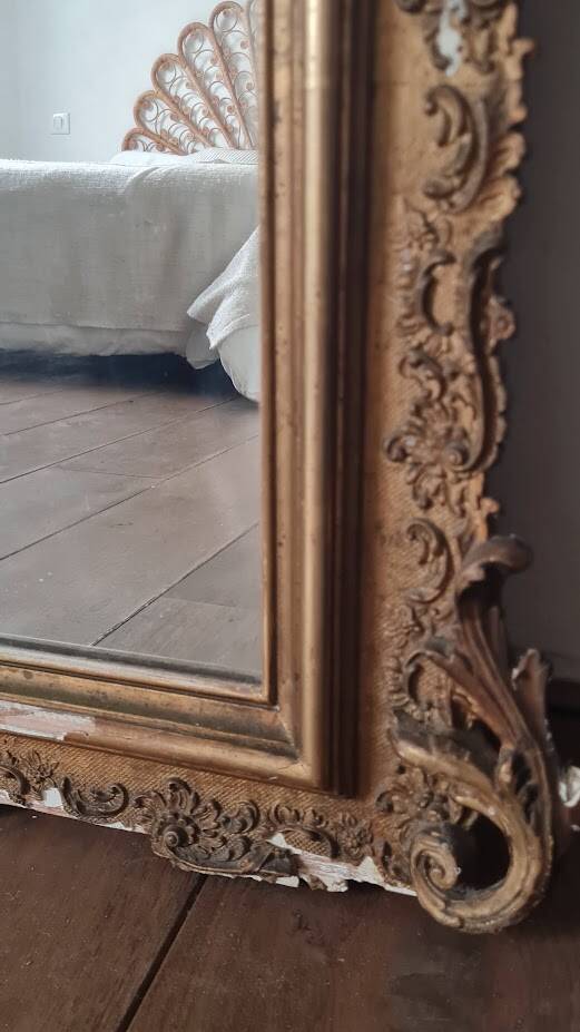 Antique Louis Philippe mirror with a pediment.