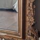 Antique Louis Philippe mirror with a pediment.