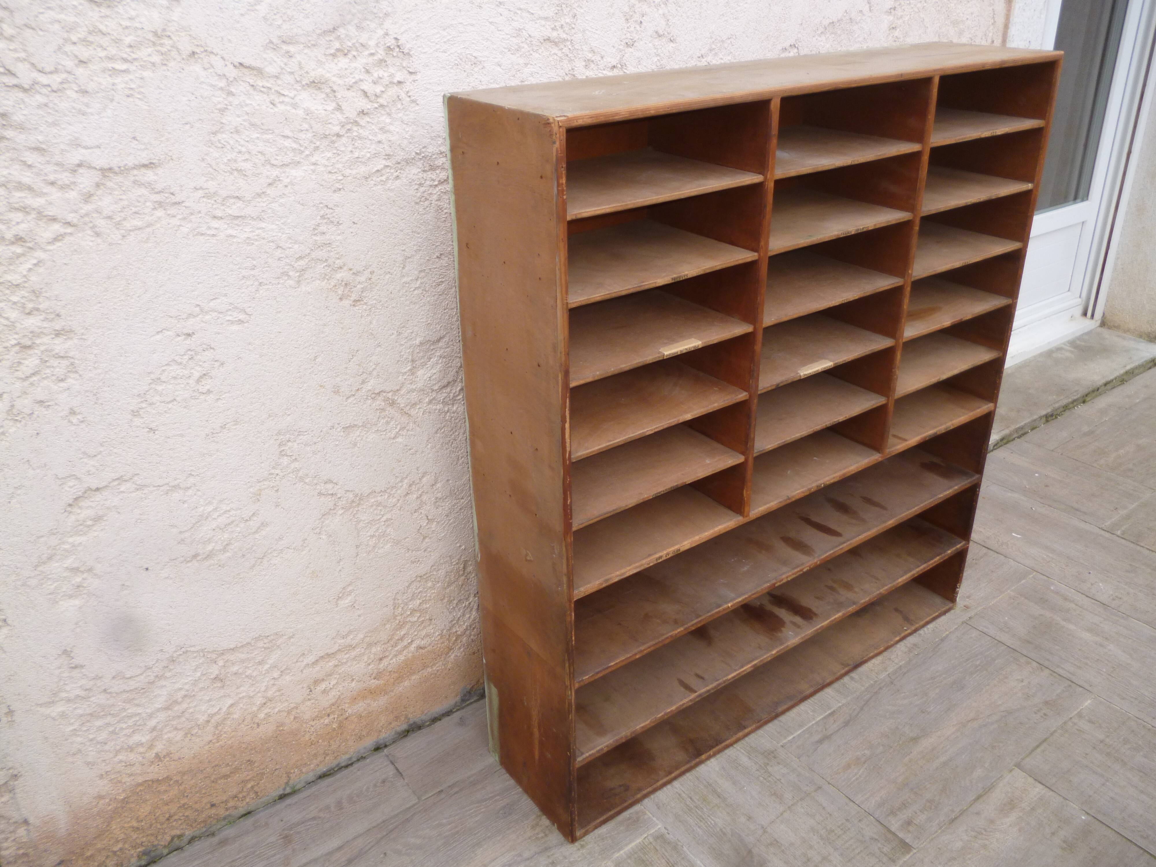 Sorting wood locker cabinet with Vintage labels