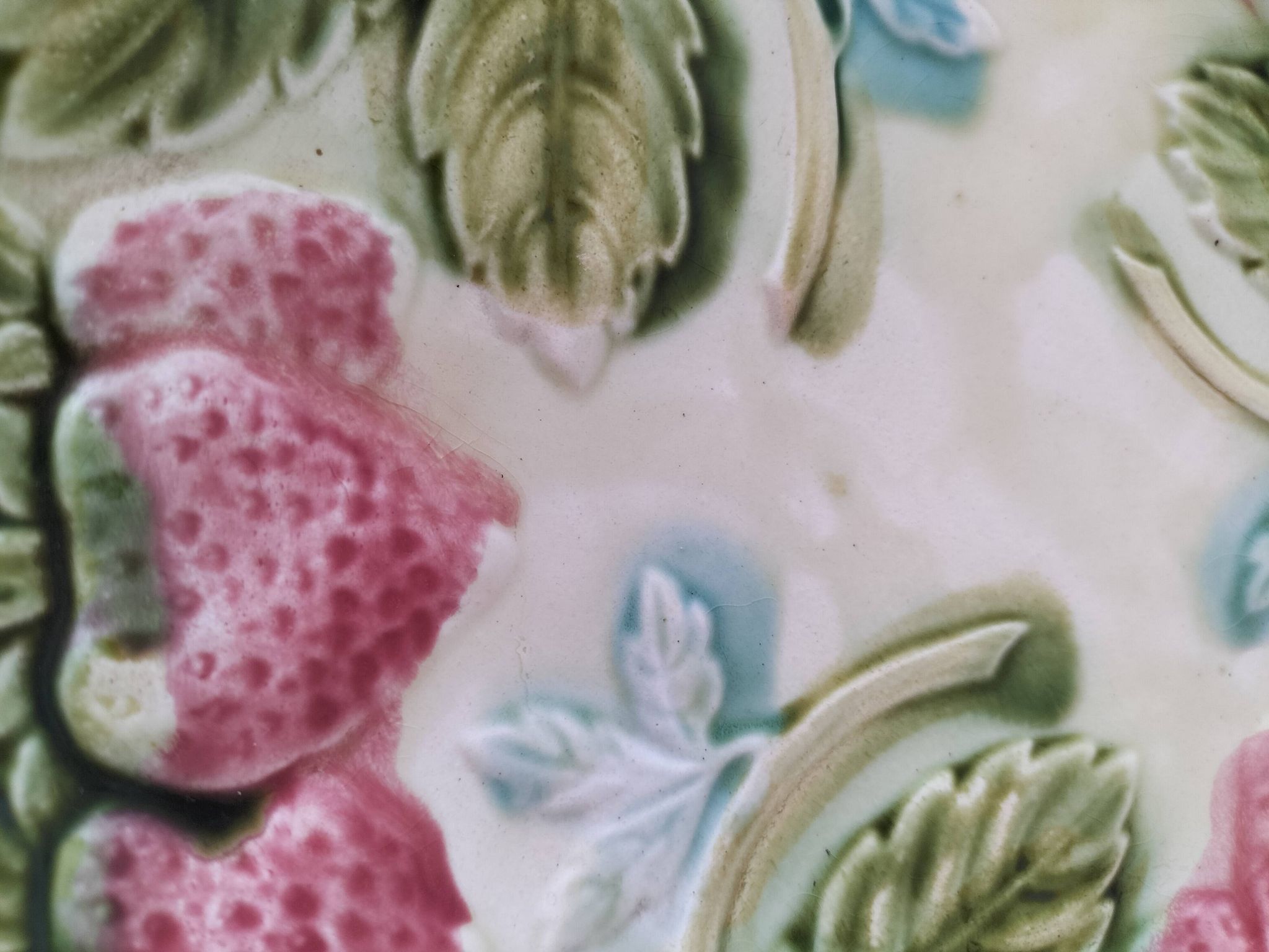 Barbotine plate with strawberries in relief, late 19th and early 20th century